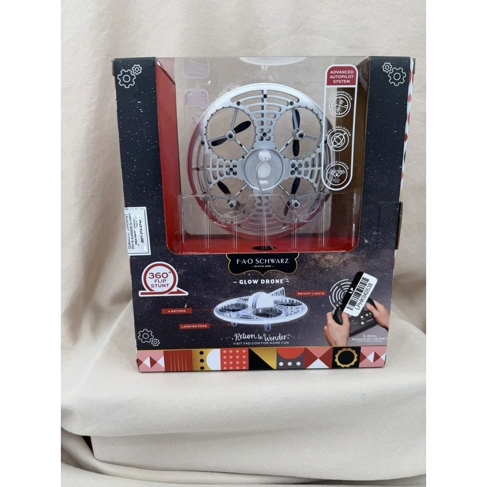 FAO Schwarz Glow Drone Remote Control LED Stunt UFO Drone Lights 360° Flips Gyro
